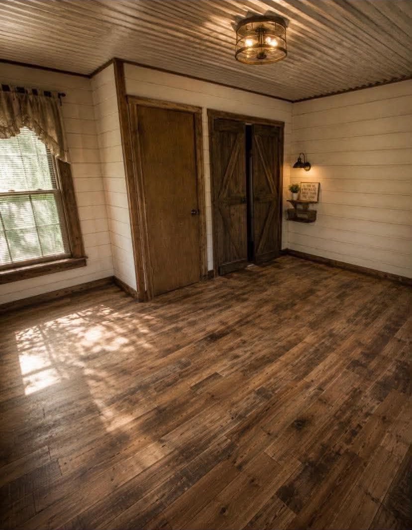 Remodeled bedroom with barn-door closets
